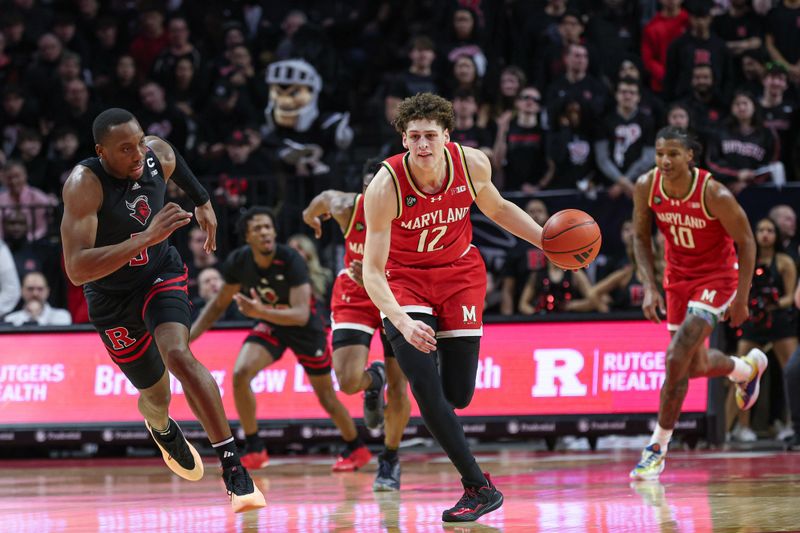 Feb 25, 2024; Piscataway, New Jersey, USA; Maryland Terrapins forward Jamie Kaiser Jr. (12) dribbles up court after a steal against Rutgers Scarlet Knights forward Mawot Mag (3) during the first half at Jersey Mike's Arena. Mandatory Credit: Vincent Carchietta-USA TODAY Sports