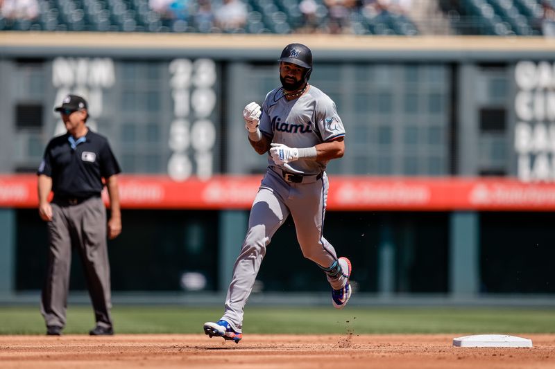 Aug 29, 2024; Denver, Colorado, USA; Miami Marlins center fielder Derek Hill (58) gestures as he rounds the bases on a solo home run in the second inning against the Colorado Rockies at Coors Field. Mandatory Credit: Isaiah J. Downing-USA TODAY Sports