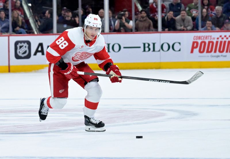 Apr 16, 2024; Montreal, Quebec, CAN; Detroit Red Wings forward Patrick Kane (88) on his way to score the winning goal during the shootout period against the Montreal Canadiens at the Bell Centre. Mandatory Credit: Eric Bolte-USA TODAY Sports