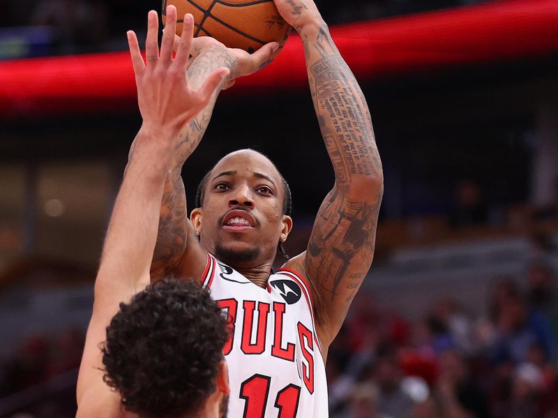 CHICAGO, ILLINOIS - FEBRUARY 26: DeMar DeRozan #11 of the Chicago Bulls shoots over Anthony Gill #16 of the Washington Wizards during the second half at United Center on February 26, 2023 in Chicago, Illinois. NOTE TO USER: User expressly acknowledges and agrees that, by downloading and or using this photograph, User is consenting to the terms and conditions of the Getty Images License Agreement.  (Photo by Michael Reaves/Getty Images)