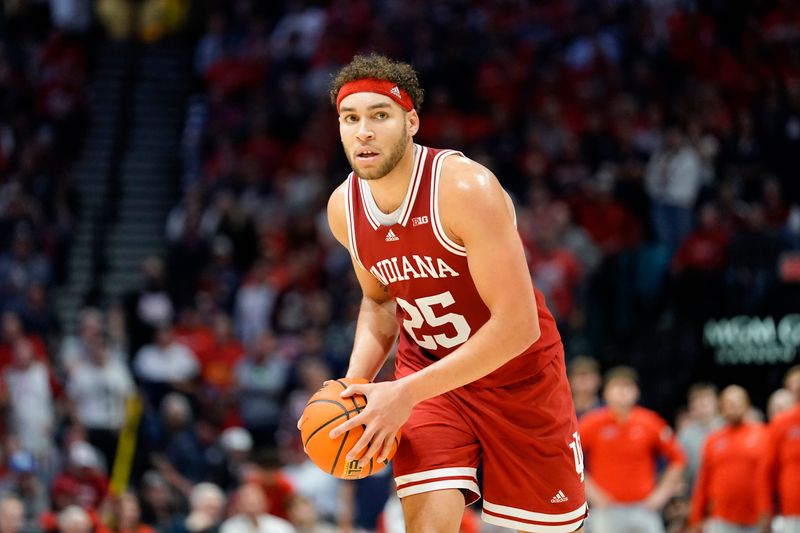 Dec 10, 2022; Las Vegas, Nevada, USA; Indiana Hoosiers forward Race Thompson (25) controls the ball against the Arizona Wildcats during the second half at MGM Grand Garden Arena. Mandatory Credit: Lucas Peltier-USA TODAY Sports