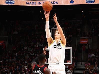 TORONTO, CANADA - DECEMBER 23:  Lauri Markkanen #23 of the Utah Jazz shoots a three point basket during the game against the Toronto Raptors on December 23, 2023 at the Scotiabank Arena in Toronto, Ontario, Canada.  NOTE TO USER: User expressly acknowledges and agrees that, by downloading and or using this Photograph, user is consenting to the terms and conditions of the Getty Images License Agreement.  Mandatory Copyright Notice: Copyright 2023 NBAE (Photo by Vaughn Ridley/NBAE via Getty Images)