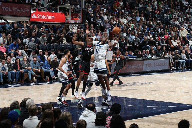 MINNEAPOLIS, MN -  FEBRUARY 4: Naz Reid #11 of the Minnesota Timberwolves grabs a rebound during the game against the Houston Rockets on February 4, 2024 at Target Center in Minneapolis, Minnesota. NOTE TO USER: User expressly acknowledges and agrees that, by downloading and or using this Photograph, user is consenting to the terms and conditions of the Getty Images License Agreement. Mandatory Copyright Notice: Copyright 2024 NBAE (Photo by David Sherman/NBAE via Getty Images)