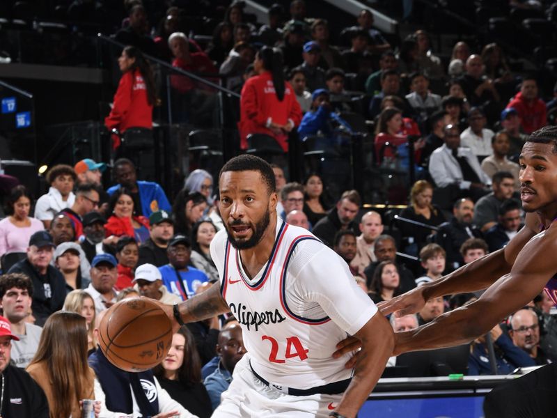 INGLEWOOD, CA - NOVEMBER 9: Norman Powell #24 of the LA Clippers dribbles the ball during the game against the Toronto Raptors on November 9, 2024 at Intuit Dome in Los Angeles, California. NOTE TO USER: User expressly acknowledges and agrees that, by downloading and/or using this Photograph, user is consenting to the terms and conditions of the Getty Images License Agreement. Mandatory Copyright Notice: Copyright 2024 NBAE (Photo by Noah Graham/NBAE via Getty Images)