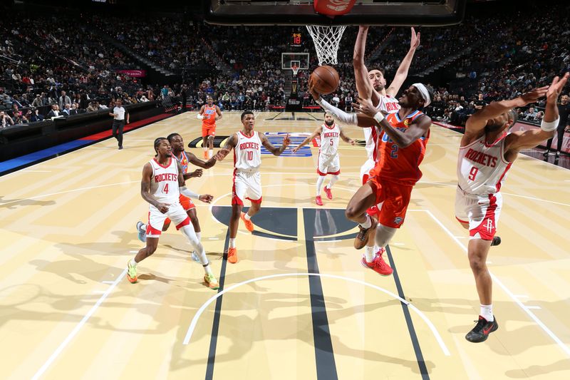 LAS VEGAS, NV - DECEMBER 14: Shai Gilgeous-Alexander #2 of the Oklahoma City Thunder drives to the basket during the game against the Houston Rockets during the Emirates NBA Cup Semifinal game on December 14, 2024 at T-Mobile Arena in Las Vegas, Nevada. NOTE TO USER: User expressly acknowledges and agrees that, by downloading and/or using this Photograph, user is consenting to the terms and conditions of the Getty Images License Agreement. Mandatory Copyright Notice: Copyright 2024 NBAE (Photo by Nathaniel S. Butler/NBAE via Getty Images)