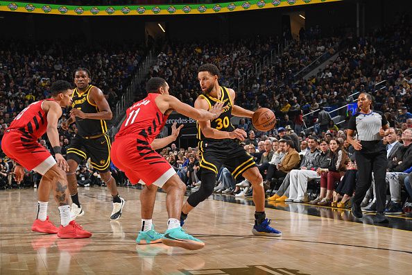 SAN FRANCISCO, CA - DECEMBER 23: Stephen Curry #30 of the Golden State Warriors dribbles the ball during the game against the Portland Trail Blazers on December 23, 2023 at Chase Center in San Francisco, California. NOTE TO USER: User expressly acknowledges and agrees that, by downloading and or using this photograph, user is consenting to the terms and conditions of Getty Images License Agreement. Mandatory Copyright Notice: Copyright 2023 NBAE (Photo by Noah Graham/NBAE via Getty Images)