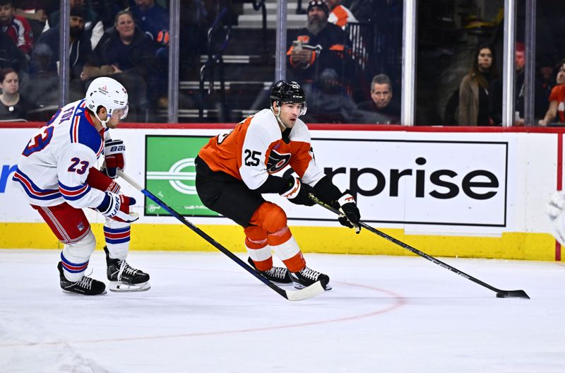 Feb 24, 2024; Philadelphia, Pennsylvania, USA; Philadelphia Flyers center Ryan Poehling (25) controls the puck against New York Rangers defenseman Adam Fox (23) in the first period at Wells Fargo Center. Mandatory Credit: Kyle Ross-USA TODAY Sports