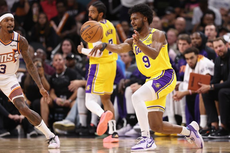 PHOENIX, ARIZONA - OCTOBER 17: Bronny James #9 of the Los Angeles Lakers passes the ball during the second half of the preseason NBA game against the Phoenix Suns at Footprint Center on October 17, 2024 in Phoenix, Arizona. NOTE TO USER: User expressly acknowledges and agrees that, by downloading and/or using this photograph, user is consenting to the terms and conditions of the Getty Images License Agreement.  (Photo by Christian Petersen/Getty Images)