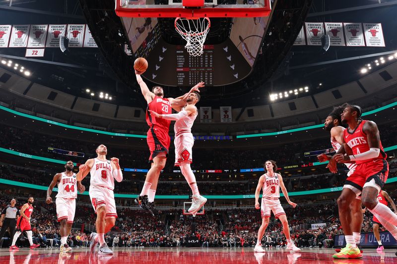 CHICAGO, IL - NOVEMBER 17:  Alperen Sengun #28 of the Houston Rockets drives to the basket during the game against the Chicago Bulls  during a regular season game on November 17, 2024 at United Center in Chicago, Illinois. NOTE TO USER: User expressly acknowledges and agrees that, by downloading and or using this photograph, User is consenting to the terms and conditions of the Getty Images License Agreement. Mandatory Copyright Notice: Copyright 2024 NBAE (Photo by Jeff Haynes/NBAE via Getty Images)