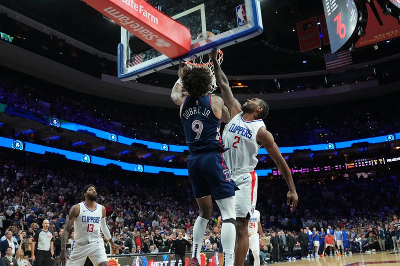 PHILADELPHIA, PA - MARCH 27: Kawhi Leonard #2 of the LA Clippers blocks Kelly Oubre Jr. #9 of the Philadelphia 76ers during the game on March 27, 2024 at the Wells Fargo Center in Philadelphia, Pennsylvania NOTE TO USER: User expressly acknowledges and agrees that, by downloading and/or using this Photograph, user is consenting to the terms and conditions of the Getty Images License Agreement. Mandatory Copyright Notice: Copyright 2024 NBAE (Photo by Jesse D. Garrabrant/NBAE via Getty Images)