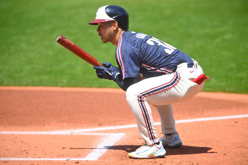 Jul 7, 2024; Cleveland, Ohio, USA; Cleveland Guardians left fielder Steven Kwan (38) stretches before batting in the first inning against the San Francisco Giants at Progressive Field. Mandatory Credit: David Richard-USA TODAY Sports