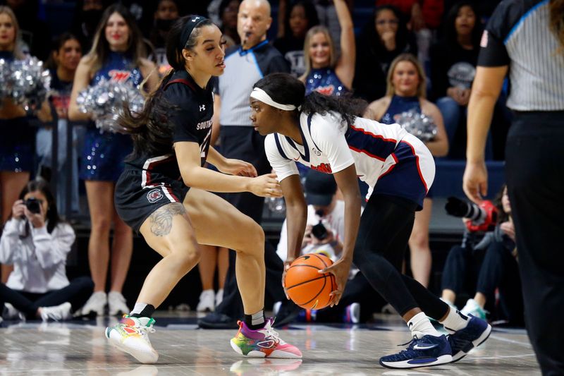 Feb 19, 2023; Oxford, Mississippi, USA; Mississippi Rebels guard Marquesha Davis (2) handles the ball against South Carolina Gamecocks guard Brea Beal (12) during the first half at The Sandy and John Black Pavilion at Ole Miss. Mandatory Credit: Petre Thomas-USA TODAY Sports