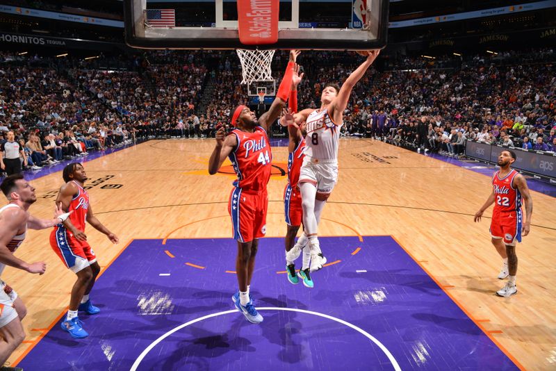 PHOENIX, AZ - MARCH 20: Grayson Allen #8 of the Phoenix Suns drives to the basket during the game against the Philadelphia 76ers on March 20, 2024 at Footprint Center in Phoenix, Arizona. NOTE TO USER: User expressly acknowledges and agrees that, by downloading and or using this photograph, user is consenting to the terms and conditions of the Getty Images License Agreement. Mandatory Copyright Notice: Copyright 2024 NBAE (Photo by Barry Gossage/NBAE via Getty Images)