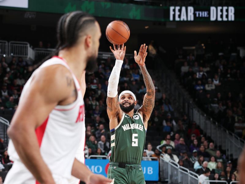 MILWAUKEE, WI - NOVEMBER 18: Gary Trent Jr. #5 of the Milwaukee Bucks shoots a three point basket during the game against the Houston Rockets on November 18, 2024 at the Fiserv Forum Center in Milwaukee, Wisconsin. NOTE TO USER: User expressly acknowledges and agrees that, by downloading and or using this Photograph, user is consenting to the terms and conditions of the Getty Images License Agreement. Mandatory Copyright Notice: Copyright 2024 NBAE (Photo by Gary Dineen/NBAE via Getty Images).