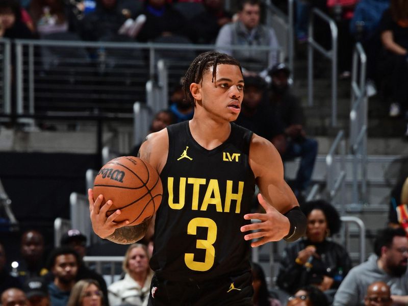 ATLANTA, GA - FEBRUARY 27: Keyonte George #3 of the Utah Jazz dribbles the ball during the game against the Atlanta Hawks on February 27, 2024 at State Farm Arena in Atlanta, Georgia.  NOTE TO USER: User expressly acknowledges and agrees that, by downloading and/or using this Photograph, user is consenting to the terms and conditions of the Getty Images License Agreement. Mandatory Copyright Notice: Copyright 2024 NBAE (Photo by Scott Cunningham/NBAE via Getty Images)