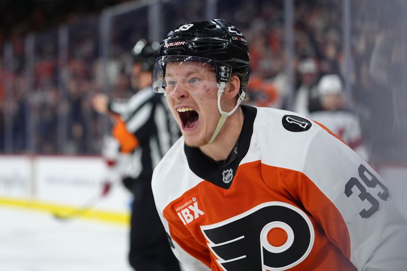 Nov 22, 2025; Philadelphia, Pennsylvania, USA; Philadelphia Flyers right wing Matvei Michkov (39) reacts after scoring a goal against the New Jersey Devils in the first period at Xfinity Mobile Arena. Mandatory Credit: Kyle Ross-Imagn Images