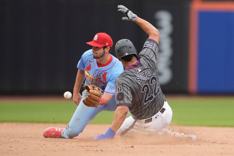 Apr 19, 2025; New York City, New York, USA; New York Mets right fielder Juan Soto (22) steals second base with St. Louis Cardinals shortstop Thomas Saggese (25) receiving the throw during the sixth inning at Citi Field. Mandatory Credit: Gregory Fisher-Imagn Images