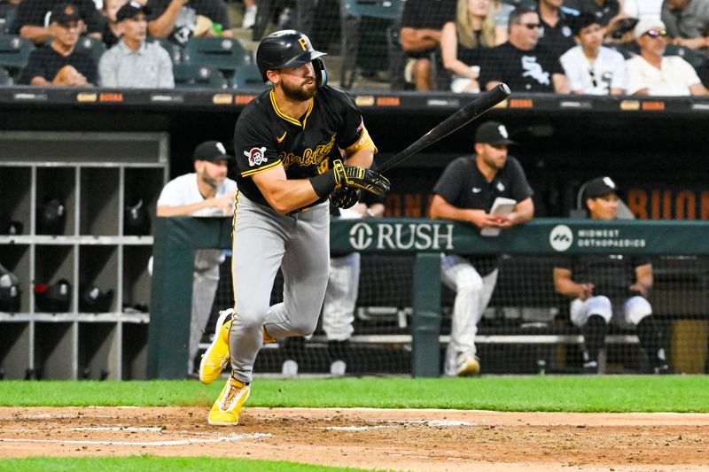 Jul 12, 2024; Chicago, Illinois, USA;  Pittsburgh Pirates second baseman Jared Triolo (19)  hits an RBI single against the Chicago White Sox during the fifth inning  at Guaranteed Rate Field. Mandatory Credit: Matt Marton-USA TODAY Sports