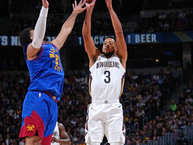 DENVER, CO - JANUARY 12: CJ McCollum #3 of the New Orleans Pelicans shoots a three point basket during the game against the Denver Nuggets on January 12, 2024 at the Ball Arena in Denver, Colorado. NOTE TO USER: User expressly acknowledges and agrees that, by downloading and/or using this Photograph, user is consenting to the terms and conditions of the Getty Images License Agreement. Mandatory Copyright Notice: Copyright 2024 NBAE (Photo by Garrett Ellwood/NBAE via Getty Images)