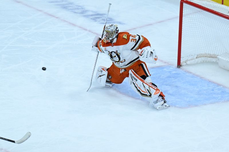 Nov 30, 2025; Chicago, Illinois, USA;  Anaheim Ducks goaltender Petr Mrazek (34) can’t stop the goal by Chicago Blackhawks center Ryan Greene (20) during the second period at United Center. Mandatory Credit: Matt Marton-Imagn Images
