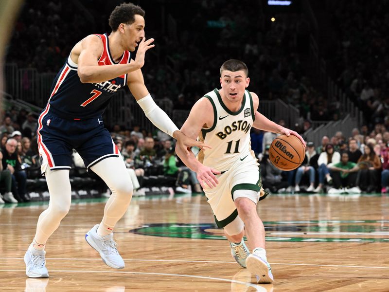 BOSTON, MASSACHUSETTS - APRIL 14: Payton Pritchard #11 of the Boston Celtics drives to the basket against Patrick Baldwin Jr. #7 of the Washington Wizards during the third quarter at the TD Garden on April 14, 2024 in Boston, Massachusetts. NOTE TO USER: User expressly acknowledges and agrees that, by downloading and or using this photograph, User is consenting to the terms and conditions of the Getty Images License Agreement. (Photo by Brian Fluharty/Getty Images)