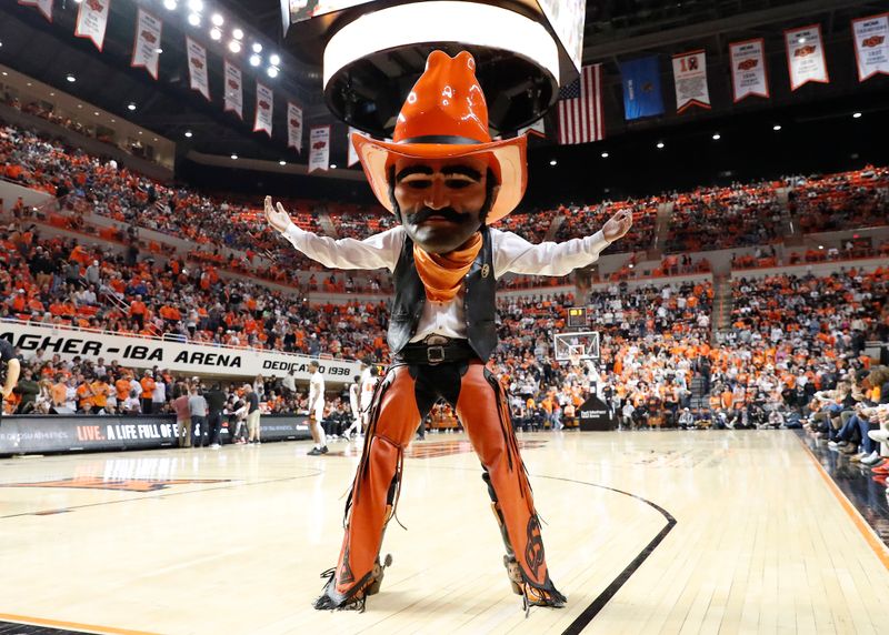 Feb 14, 2023; Stillwater, Oklahoma, USA; Oklahoma State Cowboys mascot performs during a time out against the Kansas Jayhawks during the second half at Gallagher-Iba Arena. Kansas won 87-76. Mandatory Credit: Alonzo Adams-USA TODAY Sports