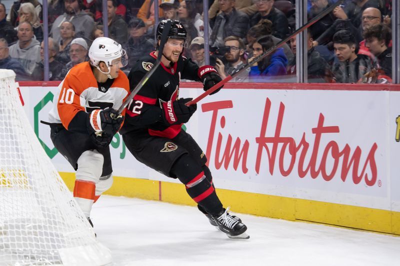 Nov 14, 2024; Ottawa, Ontario, CAN; Philadelphia Flyers right wing Bobby Brink (10) battles with Ottawa Senators defenseman thomas Chabot (72) in the second period at the Canadian Tire Centre. Mandatory Credit: Marc DesRosiers-Imagn Images