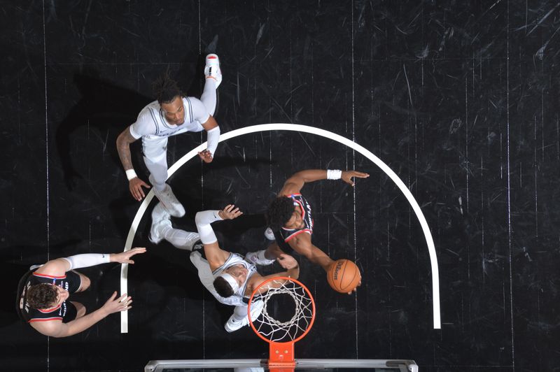 SAN ANTONIO, TX - NOVEMBER 7: Scoot Henderson #00 of the Portland Trail Blazers drives to the basket during the game against the San Antonio Spurs on November 7, 2024 at the Frost Bank Center in San Antonio, Texas. NOTE TO USER: User expressly acknowledges and agrees that, by downloading and or using this photograph, user is consenting to the terms and conditions of the Getty Images License Agreement. Mandatory Copyright Notice: Copyright 2024 NBAE (Photos by Michael Gonzales/NBAE via Getty Images)