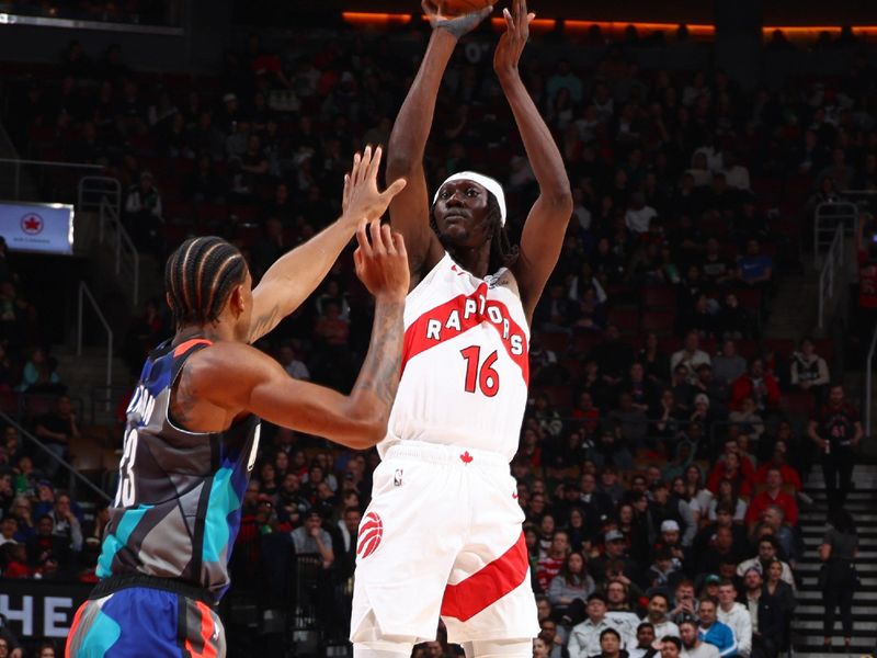 TORONTO, CANADA - MARCH 25: Mouhamadou Gueye #16 of the Toronto Raptors three point basket during the game against the Brooklyn Nets on March 25, 2024 at the Scotiabank Arena in Toronto, Ontario, Canada.  NOTE TO USER: User expressly acknowledges and agrees that, by downloading and or using this Photograph, user is consenting to the terms and conditions of the Getty Images License Agreement.  Mandatory Copyright Notice: Copyright 2024 NBAE (Photo by Vaughn Ridley/NBAE via Getty Images)