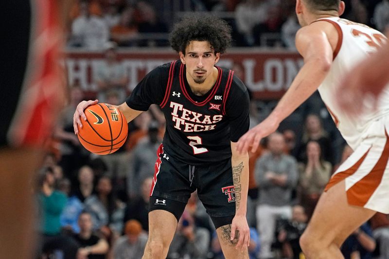 Jan 6, 2024; Austin, Texas, USA; Texas Tech Red Raiders guard Pop Isaacs (2) looks to pass the ball during the first half against the Texas Longhorns at Moody Center. Mandatory Credit: Scott Wachter-USA TODAY Sports