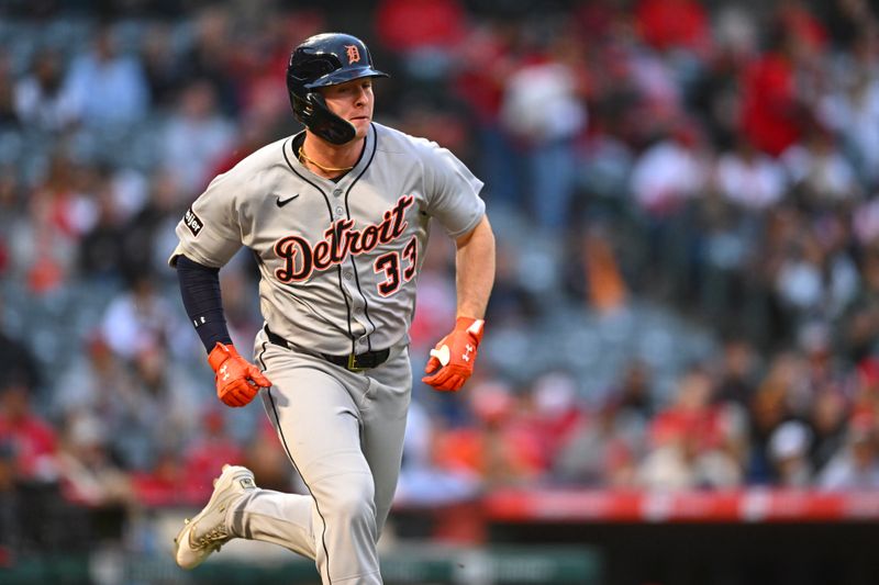 May 3, 2025; Anaheim, California, USA; Detroit Tigers designated hitter Colt Keith (33) singles against the Los Angeles Angels during the second inning at Angel Stadium. Mandatory Credit: Jonathan Hui-Imagn Images
