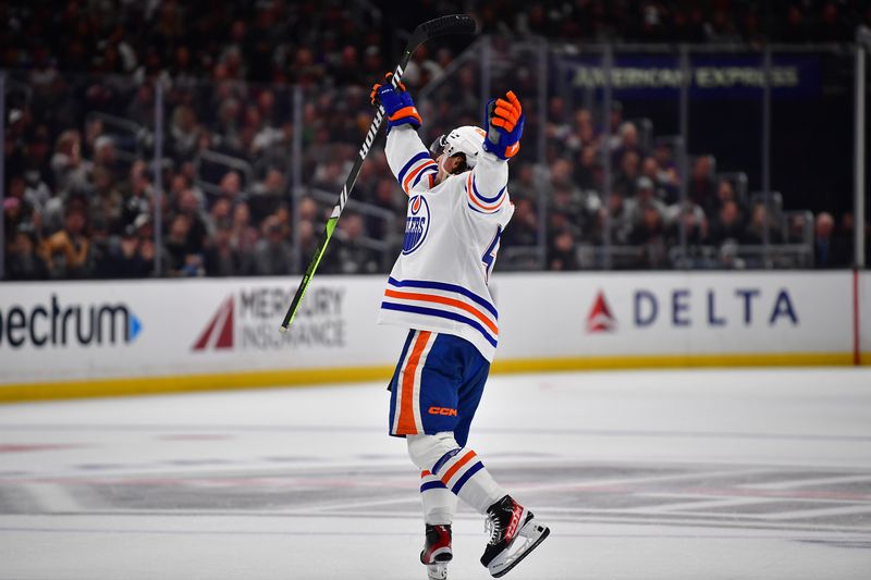 Apr 29, 2023; Los Angeles, California, USA; Edmonton Oilers right wing Kailer Yamamoto (56) celebrates his goal scored against the Los Angeles Kings during the third period in game six of the first round of the 2023 Stanley Cup Playoffs at Crypto.com Arena. Mandatory Credit: Gary A. Vasquez-USA TODAY Sports