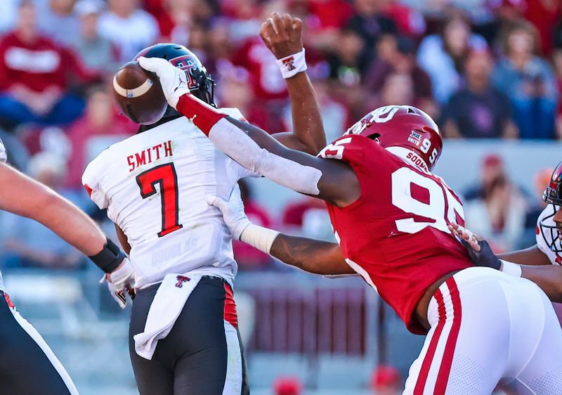 Oct 30, 2021; Norman, Oklahoma, USA; Oklahoma Sooners defensive lineman Isaiah Thomas (95) causes Texas Tech Red Raiders quarterback Donovan Smith (7) to fumble during the second half at Gaylord Family-Oklahoma Memorial Stadium. Mandatory Credit: Kevin Jairaj-USA TODAY Sports