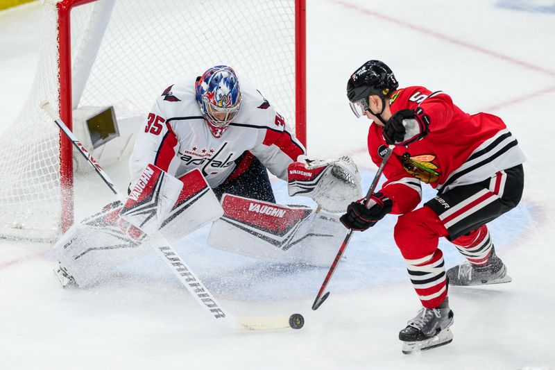 Dec 10, 2023; Chicago, Illinois, USA; Washington Capitals goaltender Darcy Kuemper (35) makes a save against Chicago Blackhawks defenseman Connor Murphy (5) during the third period at the United Center. Mandatory Credit: Daniel Bartel-USA TODAY Sports