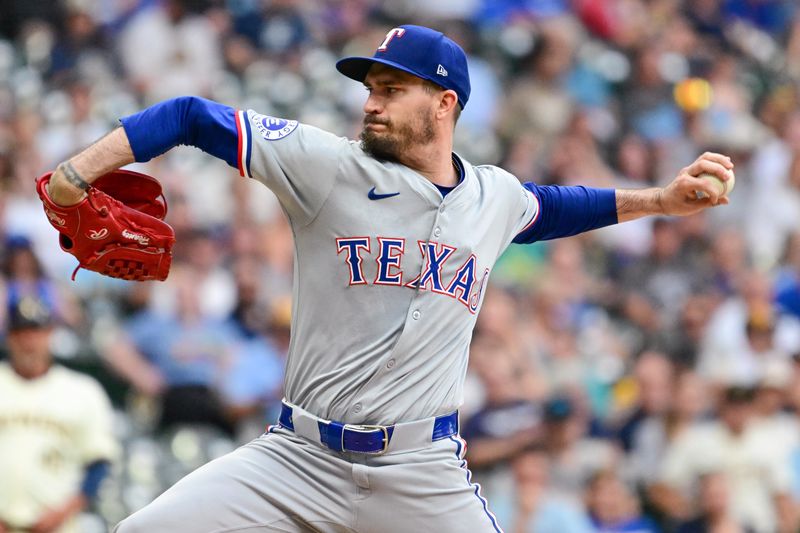 Jun 25, 2024; Milwaukee, Wisconsin, USA; Texas Rangers starting pitcher Andrew Heaney (44) pitches against the Milwaukee Brewers in the first inning at American Family Field. Mandatory Credit: Benny Sieu-USA TODAY Sports