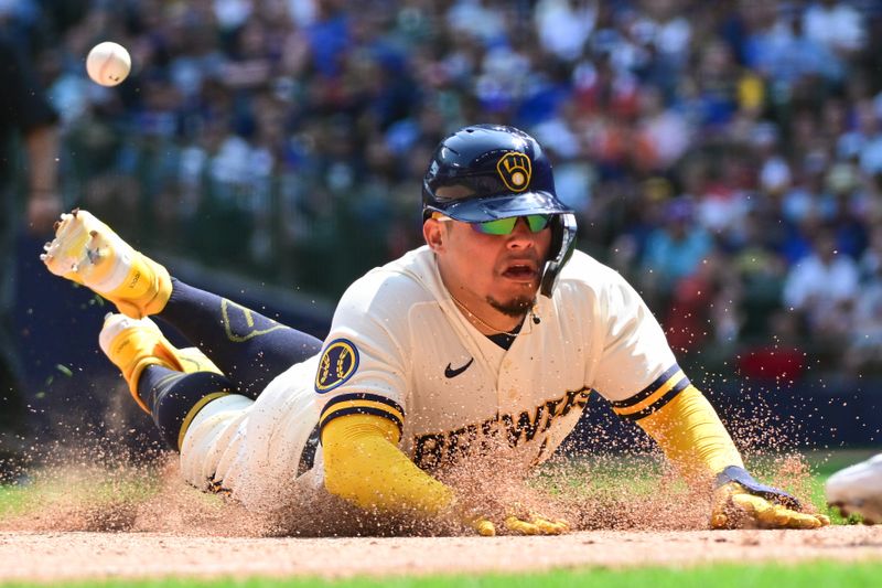 Jun 8, 2023; Milwaukee, Wisconsin, USA; Milwaukee Brewers catcher William Contreras (24) advances to third base in the sixth inning against the Baltimore Orioles at American Family Field. Mandatory Credit: Benny Sieu-USA TODAY Sports