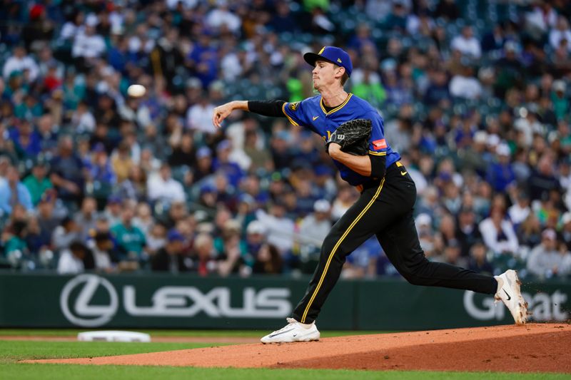 Sep 25, 2025; Seattle, Washington, USA; Seattle Mariners starting pitcher Emerson Hancock (26) throws against the Colorado Rockies during the first inning at T-Mobile Park. Mandatory Credit: Joe Nicholson-Imagn Images