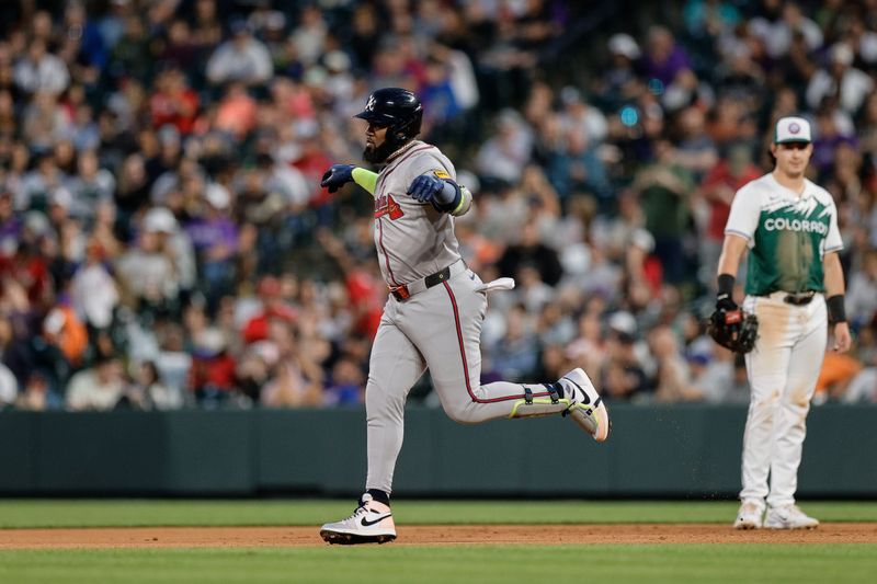 Aug 10, 2024; Denver, Colorado, USA; Atlanta Braves designated hitter Marcell Ozuna (20) gestures as he rounds the bases on a solo home run in the fifth inning against the Colorado Rockies at Coors Field. Mandatory Credit: Isaiah J. Downing-USA TODAY Sports