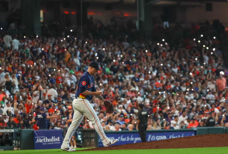 Jun 16, 2024; Houston, Texas, USA;  Houston Astros relief pitcher Ryan Pressly (55) comes in to pitch against the Detroit Tigers in the eighth inning at Minute Maid Park. Mandatory Credit: Thomas Shea-USA TODAY Sports