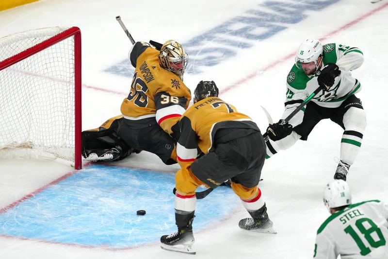 Apr 29, 2024; Las Vegas, Nevada, USA; Dallas Stars center Craig Smith (15) shoots the puck wide of an open net after beating Vegas Golden Knights goaltender Logan Thompson (36) during the third period of game four of the first round of the 2024 Stanley Cup Playoffs at T-Mobile Arena. Mandatory Credit: Stephen R. Sylvanie-USA TODAY Sports