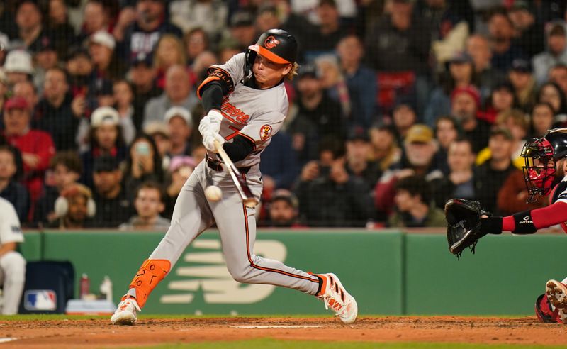 Apr 10, 2024; Boston, Massachusetts, USA; Baltimore Orioles second base Jackson Holliday (7) gets his first major league base hit against the Boston Red Sox in the fifth inning at Fenway Park. Mandatory Credit: David Butler II-USA TODAY Sports