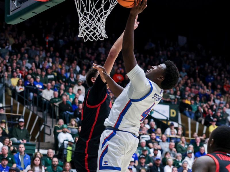 Jan 30, 2024; Fort Collins, Colorado, USA; Colorado State Rams guard Isaiah Stevens (4) drives to the basket against San Diego State Aztecs defense during the 2nd half at Moby Arena. Mandatory Credit: Chet Strange-USA TODAY Sports