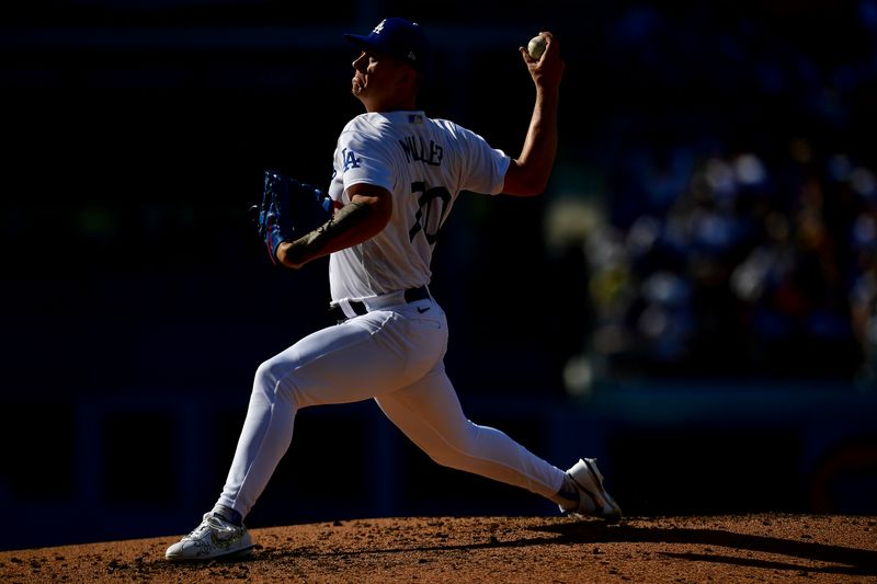 Jun 24, 2023; Los Angeles, California, USA; Los Angeles Dodgers starting pitcher Bobby Miller (70) throws against the Houston Astros during the fourth inning at Dodger Stadium. Mandatory Credit: Gary A. Vasquez-USA TODAY Sports