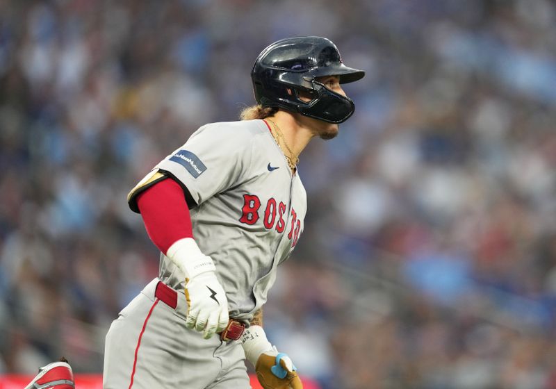 Jun 19, 2024; Toronto, Ontario, CAN; Boston Red Sox right fielder Jarren Duran (16) runs the bases after hitting a home run against the Toronto Blue Jays during fifth inning at Rogers Centre. Mandatory Credit: Nick Turchiaro-USA TODAY Sports