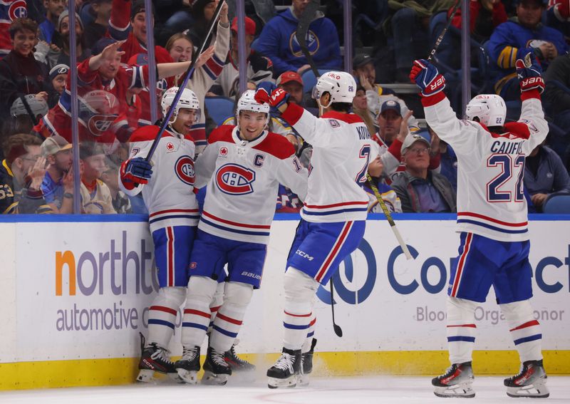 Dec 9, 2023; Buffalo, New York, USA;  Montreal Canadiens defenseman Jayden Struble (47) celebrates his goal with teammates during the second period against the Buffalo Sabres at KeyBank Center. Mandatory Credit: Timothy T. Ludwig-USA TODAY Sports