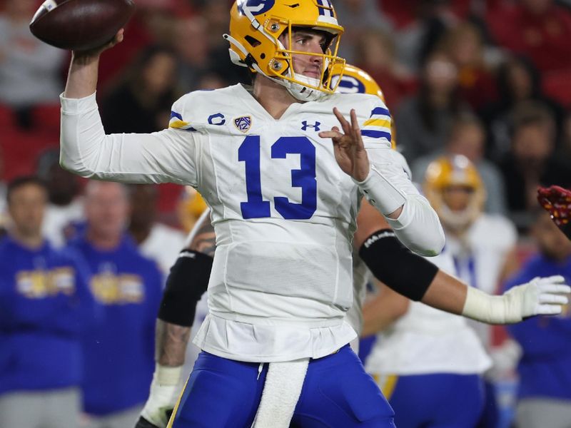 Nov 5, 2022; Los Angeles, California, USA; California Golden Bears quarterback Jack Plummer (13) looks to pass during the fourth quarter against the USC Trojans at United Airlines Field at Los Angeles Memorial Coliseum. Mandatory Credit: Kiyoshi Mio-USA TODAY Sports