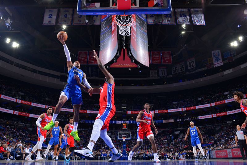 PHILADELPHIA, PA - APRIL 12: Gary Harris #14 of the Orlando Magic drives to the basket during the game against the Philadelphia 76ers on April 12, 2024 at the Wells Fargo Center in Philadelphia, Pennsylvania NOTE TO USER: User expressly acknowledges and agrees that, by downloading and/or using this Photograph, user is consenting to the terms and conditions of the Getty Images License Agreement. Mandatory Copyright Notice: Copyright 2024 NBAE (Photo by Jesse D. Garrabrant/NBAE via Getty Images)