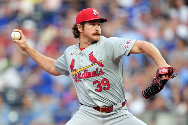 Aug 9, 2024; Kansas City, Missouri, USA; St. Louis Cardinals starting pitcher Miles Mikolas (39) pitches during the second inning against the Kansas City Royals at Kauffman Stadium. Mandatory Credit: Jay Biggerstaff-USA TODAY Sports