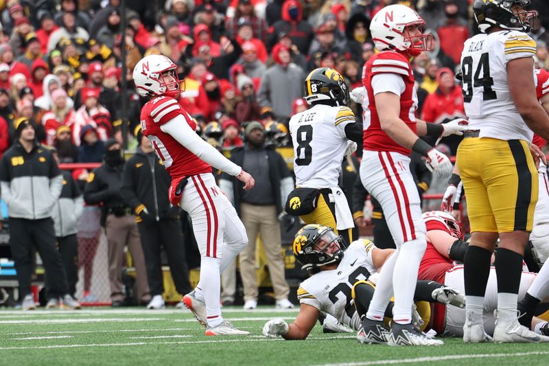 Nov 24, 2023; Lincoln, Nebraska, USA; Nebraska Cornhuskers place kicker Tristan Alvano (30) watches as he misses a field goal against the Iowa Hawkeyes at Memorial Stadium. Mandatory Credit: Reese Strickland-USA TODAY Sports