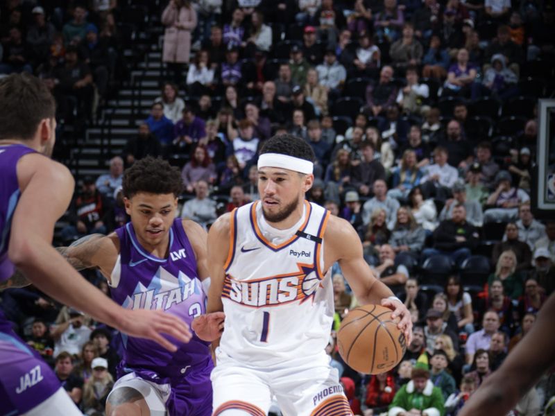 SALT LAKE CITY, UT - DECEMBER 13:  Devin Booker #1 of the Phoenix Suns dribbles the ball during the game against the Utah Jazz during a regular season game on December 13, 2024 at Delta Center in Salt Lake City, Utah. NOTE TO USER: User expressly acknowledges and agrees that, by downloading and or using this Photograph, User is consenting to the terms and conditions of the Getty Images License Agreement. Mandatory Copyright Notice: Copyright 2024 NBAE (Photo by Melissa Majchrzak/NBAE via Getty Images)